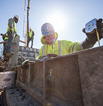 Hamill Concrete Laborer Measuring Poured Concrete Foundation