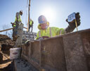 Hamill Concrete Laborer Measuring Poured Concrete Foundation