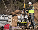 Hamill Concrete Employee Surveying Job Site